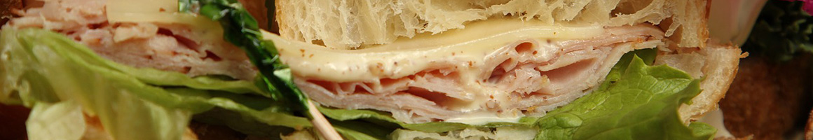 Eating Deli Italian Sandwich at Salem Food Market restaurant in Dedham, MA.
